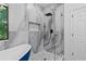 Stunning bathroom showcasing a soaking tub, walk-in shower, and premium finishes at 1355 Lockwood Sw Dr, Atlanta, GA 30311