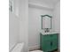 Charming bathroom with green vanity and marble countertop at 1355 Lockwood Sw Dr, Atlanta, GA 30311