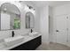Contemporary bathroom featuring dual sinks, modern fixtures, and plenty of room at 1355 Lockwood Sw Dr, Atlanta, GA 30311