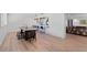 Open-concept dining room with bar area, modern lighting, and unique decor at 1355 Lockwood Sw Dr, Atlanta, GA 30311