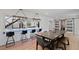 Dining area with bar seating and sliding barn doors at 1355 Lockwood Sw Dr, Atlanta, GA 30311