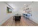 Spacious dining area with a view of the kitchen and bar seating at 1355 Lockwood Sw Dr, Atlanta, GA 30311
