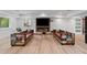 Bright living room with stylish decor, a modern fireplace, and comfortable seating, perfect for relaxation and entertaining at 1355 Lockwood Sw Dr, Atlanta, GA 30311