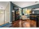 Spacious bedroom boasting hardwood floors, modern furniture, and large windows with plantation shutters at 5130 Stoneywood Se Cir, Mableton, GA 30126