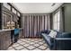 Bedroom featuring a comfortable blue velvet couch and a makeup vanity with great lighting at 5130 Stoneywood Se Cir, Mableton, GA 30126