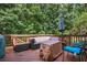 Outdoor wooden deck with seating, offering the perfect space for entertaining at 5130 Stoneywood Se Cir, Mableton, GA 30126