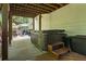 Outdoor space featuring a hot tub, storage boxes, and seating area at 5130 Stoneywood Se Cir, Mableton, GA 30126