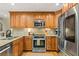 Updated kitchen featuring stainless steel appliances, granite countertops, and ample storage space at 5130 Stoneywood Se Cir, Mableton, GA 30126