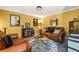 Cozy living room featuring leather sofas, stylish decor, and a comfortable atmosphere at 5130 Stoneywood Se Cir, Mableton, GA 30126