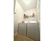 Laundry room with side-by-side washer and dryer at 134 Odyssey Turn, Conyers, GA 30012