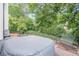 Private backyard with an inflatable hot tub on a brick patio with wrought iron seating at 86 Whitlock Sw Sq, Marietta, GA 30064