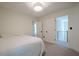 Bedroom featuring white walls, carpet flooring, and open doors to an upstairs hallway at 86 Whitlock Sw Sq, Marietta, GA 30064