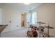 Bedroom featuring a drum set, and view into an ensuite bathroom at 86 Whitlock Sw Sq, Marietta, GA 30064