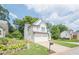 Charming two-story home with white brick and siding, attached two-car garage, and well-maintained landscaping at 86 Whitlock Sw Sq, Marietta, GA 30064