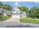 Charming two-story home with white brick and siding, attached two-car garage, and well-maintained landscaping at 86 Whitlock Sw Sq, Marietta, GA 30064
