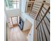Entryway features a storage rack, wooden door, and modern railing at 86 Whitlock Sw Sq, Marietta, GA 30064