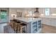 Kitchen island with white countertops, bar stool seating, and an open shelving at 86 Whitlock Sw Sq, Marietta, GA 30064