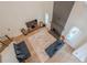 Open-concept living room features tall ceilings, hardwood flooring, and comfortable seating at 86 Whitlock Sw Sq, Marietta, GA 30064