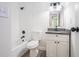 Clean bathroom featuring a bath tub, toilet, and vanity with granite countertop at 3195 Newcastle Way, Snellville, GA 30039