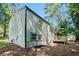 Exterior view of home featuring siding, a deck, and a shed at 3195 Newcastle Way, Snellville, GA 30039