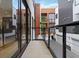 Private balcony offers a peaceful retreat with views of the surrounding buildings and cityscape at 367 Parkway Ne Dr # 7, Atlanta, GA 30312