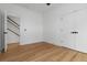 Bright bedroom boasts hardwood floors, natural light, and a closet with double doors at 367 Parkway Ne Dr # 7, Atlanta, GA 30312