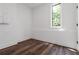 Cozy bedroom with dark wood floors and ample natural light at 367 Parkway Ne Dr # 7, Atlanta, GA 30312
