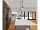 Modern kitchen features a large island with sleek countertops and stainless steel appliances at 367 Parkway Ne Dr # 7, Atlanta, GA 30312