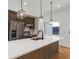Modern kitchen boasts stainless steel appliances, white countertops, and stylish pendant lighting at 367 Parkway Ne Dr # 7, Atlanta, GA 30312