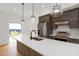 Modern kitchen boasts stainless steel appliances, white countertops, and stylish pendant lighting at 367 Parkway Ne Dr # 7, Atlanta, GA 30312