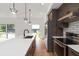 Modern kitchen features a large island with sleek countertops and stainless steel appliances at 367 Parkway Ne Dr # 7, Atlanta, GA 30312