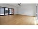 Bright, open living room with hardwood floors, sliding glass doors, and recessed lighting at 367 Parkway Ne Dr # 7, Atlanta, GA 30312