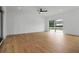 Spacious living room showcasing hardwood floors, large windows, and modern fixtures at 367 Parkway Ne Dr # 7, Atlanta, GA 30312