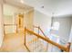 Hallway with stairs and a chandelier at 5771 Vinings Retreat Sw Way, Mableton, GA 30126