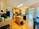 Spacious kitchen with an island, granite countertops, and ample cabinet space at 5771 Vinings Retreat Sw Way, Mableton, GA 30126