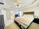 Comfortable main bedroom suite with a king-sized bed, a ceiling fan, and lots of space at 5771 Vinings Retreat Sw Way, Mableton, GA 30126