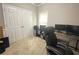 Well-lit office featuring a dedicated workspace and closet, perfect for a home office environment at 5771 Vinings Retreat Sw Way, Mableton, GA 30126