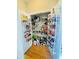 Well-stocked walk-in pantry with ample shelving and storage solutions for organization at 5771 Vinings Retreat Sw Way, Mableton, GA 30126