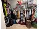 Spacious walk-in closet with ample storage space and organizational features, perfect for keeping clothes tidy at 5771 Vinings Retreat Sw Way, Mableton, GA 30126