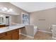 A bathroom featuring tile floors, dual sinks, a soaking tub, and a window at 5148 Coolamber Dr, Powder Springs, GA 30127
