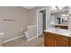 Bathroom featuring tile floors, toilet, dual sinks, and an entrance to another room at 5148 Coolamber Dr, Powder Springs, GA 30127