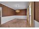 Bright dining room with classic wallpaper and natural light at 5148 Coolamber Dr, Powder Springs, GA 30127