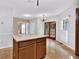Cozy kitchen featuring a center island, tile floors and a chandelier at 5148 Coolamber Dr, Powder Springs, GA 30127