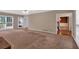 Expansive living room with multiple doorways and large windows at 5148 Coolamber Dr, Powder Springs, GA 30127