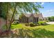 The serene backyard provides a private retreat with mature trees and lush greenery at 6042 Brookhaven Cir # 3202, Johns Creek, GA 30097