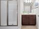 Bathroom with glass shower, vanity with drawers, and tile flooring at 6042 Brookhaven Cir # 3202, Johns Creek, GA 30097