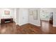 Welcoming foyer with gleaming hardwood floors, creating a seamless transition into the home at 6042 Brookhaven Cir # 3202, Johns Creek, GA 30097