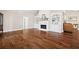 Spacious living room features a fireplace and built-in shelving units at 6042 Brookhaven Cir # 3202, Johns Creek, GA 30097