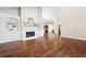 Spacious living room features a fireplace and built-in shelving units at 6042 Brookhaven Cir # 3202, Johns Creek, GA 30097