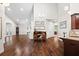 Bright and airy living room featuring cathedral ceilings and seamlessly connecting to other living spaces at 6042 Brookhaven Cir # 3202, Johns Creek, GA 30097